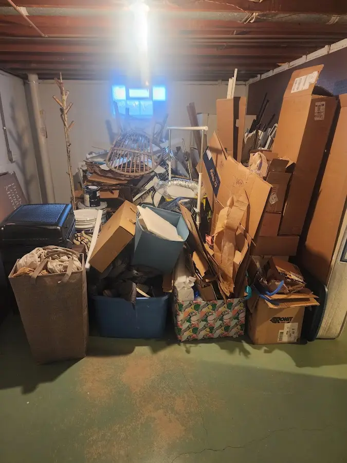 Roll-off dumpster container at job site for Yard Waste Dumpster Rental in Fayetteville